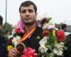 قهرمان کیک بوکسینگ آسیا مدال طلای خود را تقدیم به شهید صانعی کرد 